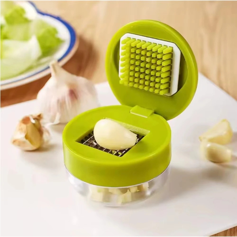ガーリックプレスチョッパー 手動ガーリックミンサー スライサ - Kitchen Gadgets Vegetable Cutter のレビューと価格